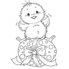 Dibujo de Pollito sentado sobre un huevo de Pascua con lazo para colorear
