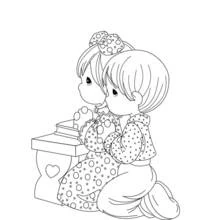 Dibujo de Dos niños rezando juntos para colorear