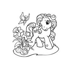Dibujo de My Little Pony encontrando huevos de Pascua entre flores para colorear