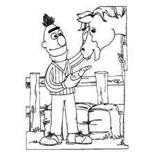 Dibujo de Beto dando una zanahoria a un caballo para colorear Dibujo de Beto dando una zanahoria a un caballo para colorear