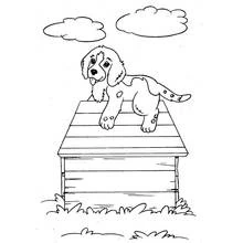 Dibujo de Cachorro de pie sobre el tejado de una Caseta de Perro para colorear