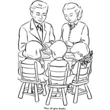 Dibujo de Familia orando juntos en la mesa para colorear