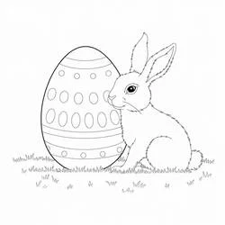 Dibujo de Huevo de Pascua y un conejo sentado en la hierba para colorear Dibujo de Huevo de Pascua y un conejo sentado en la hierba para colorear
