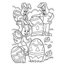 Dibujo de Conejos de Pascua con cestas y huevos gigantes para colorear